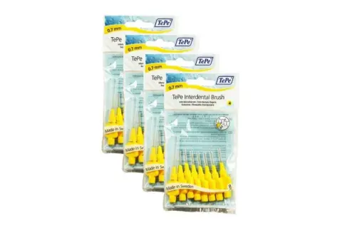 Paquetes de cepillos interdentales TePe de 0.7 mm, mostrando varios tipos y tamaños para una higiene bucal completa.